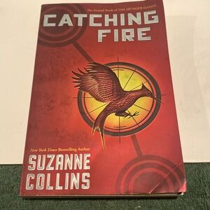 “Catching Fire,” The second book of the Hunger Games. Paperback
